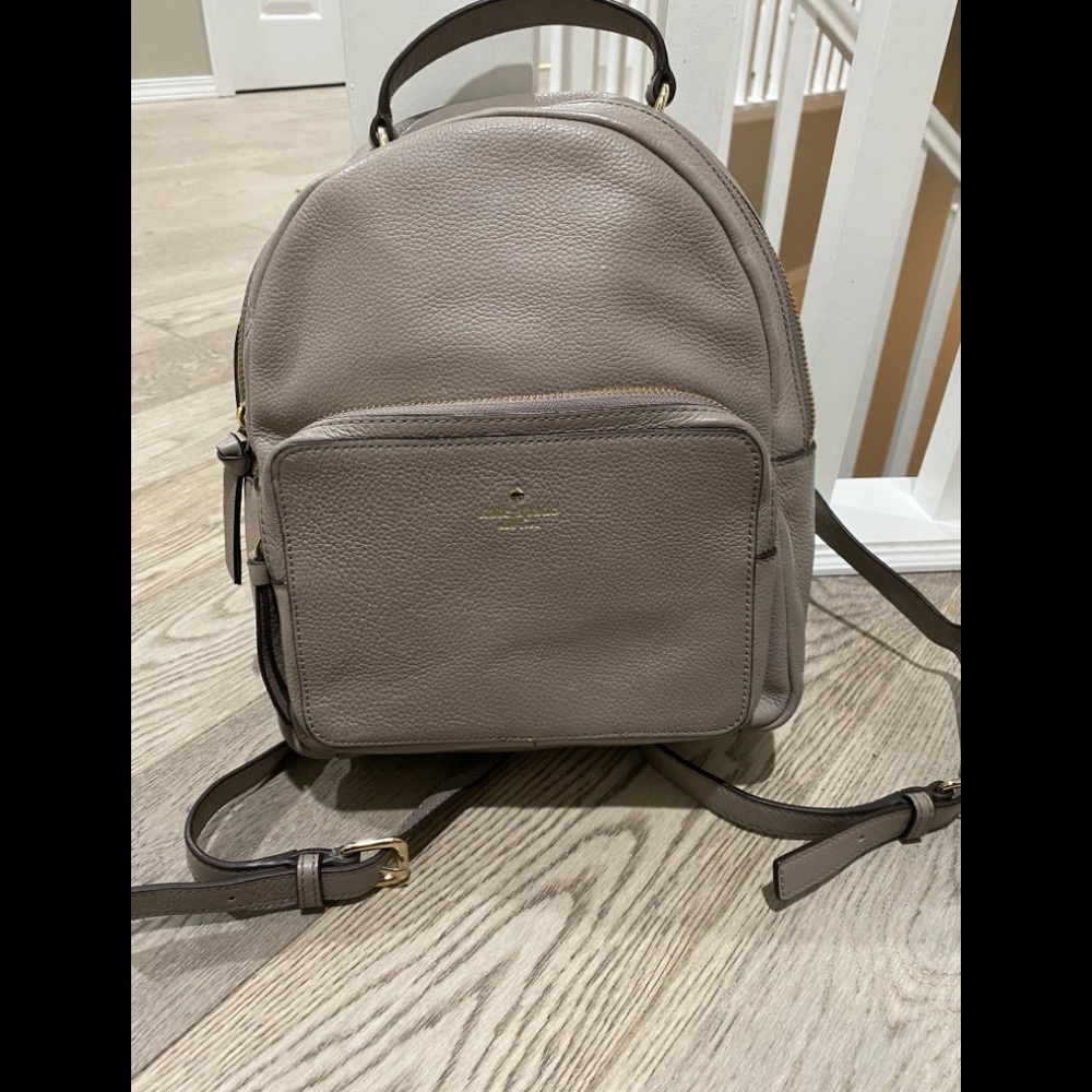 Kate Spade mini backpack purse in gray taupe
